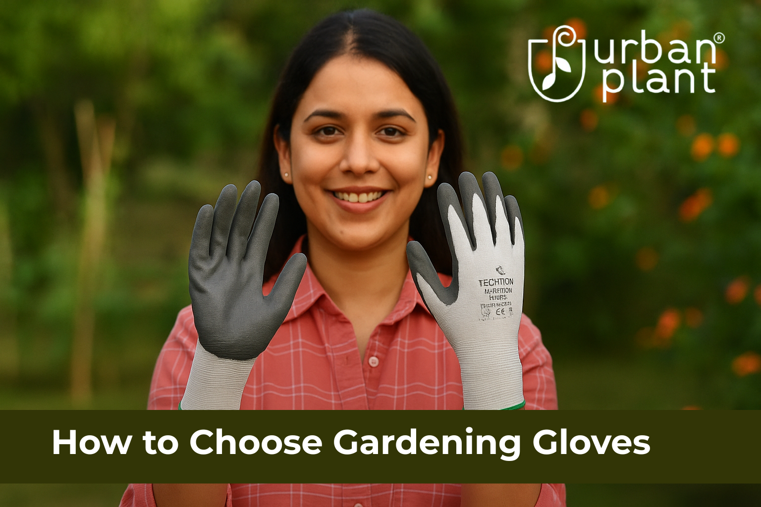 An Indian woman smiling while holding a pair of Techtion nitrile gardening gloves in a lush garden, showcasing how to choose the best gardening gloves for safety and comfort